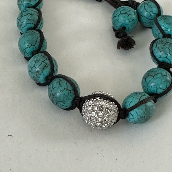 Turquoise beaded bracelet strung with waxed cord with crystal accent bead - Picture 3 of 5